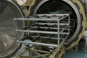 Inserting rack into a composite autoclave systems